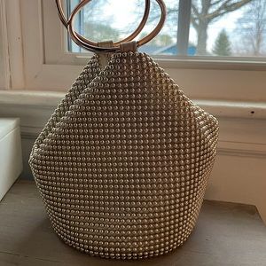 Super Cute Gold Olga Berg Bag. Never worn and in perfect condition.